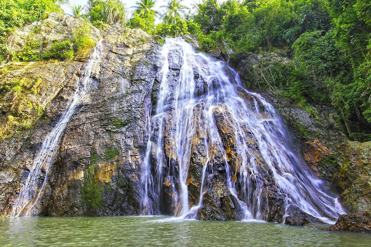 The Na Muang Waterfalls are a refreshing retreat from the tropical heat